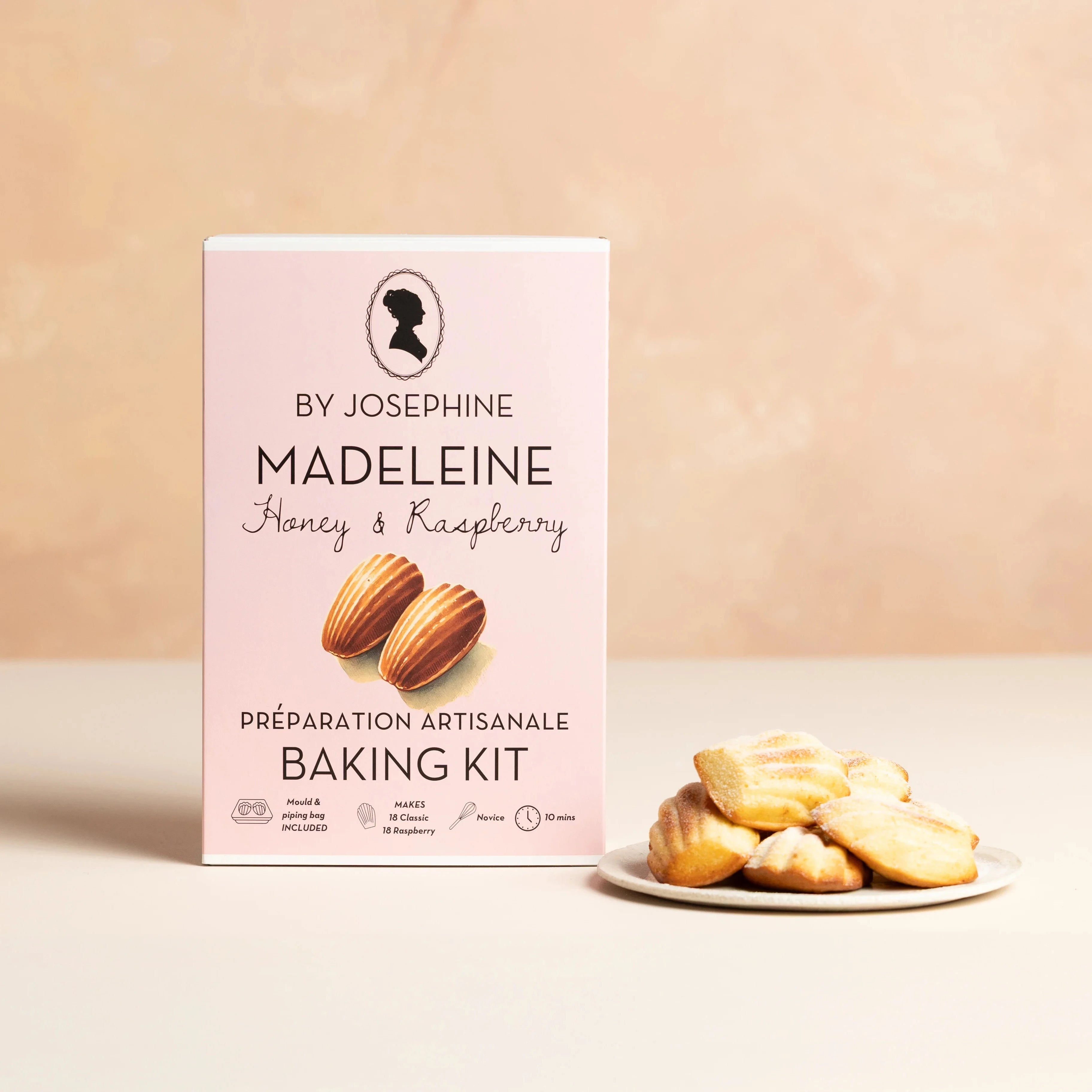 Baking kit packaging with Madeleine on a beige background